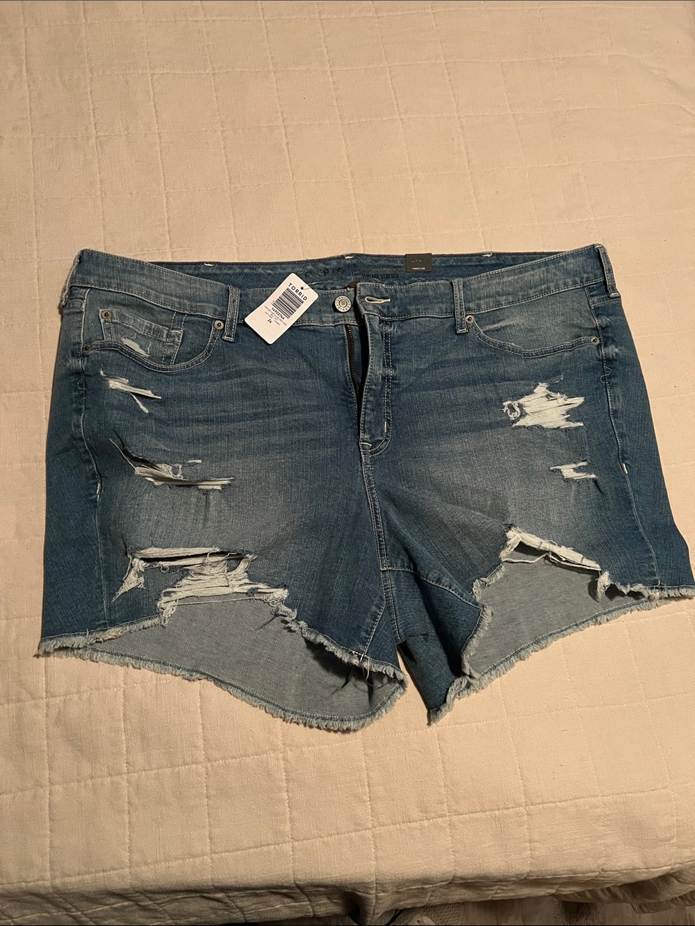 24 Plus size NWT torrid Distressed Medium Blue Denim Cutoff Shorts
